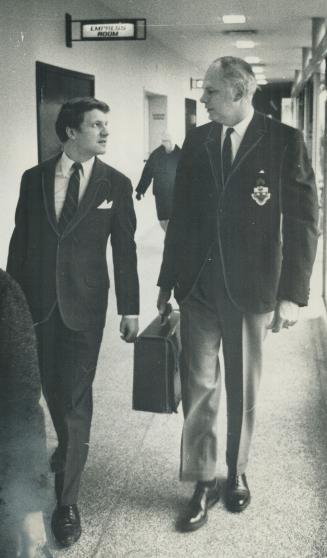 Can they solve the housing crisis? Federal Transport Minister Paul Hellyer, in picture at left, and excutive assistant Lloyd Axworthy (left) enter fed(...)