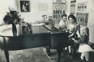 Pianist Sheila Henig sits in the music room of the family's new home in Willowdale with husband William Sidney and children Derek, 3, and Shawna, 6. M(...)