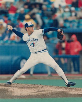 Tom Henke's overhand delivery and blazing fastball are the perfect counterpoint to Mark Eichhorn's nearly underarm motion and super slow pitches. Eichhorn sets' em up and Henke knocks' em down