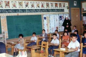 Children and teacher in the classroom