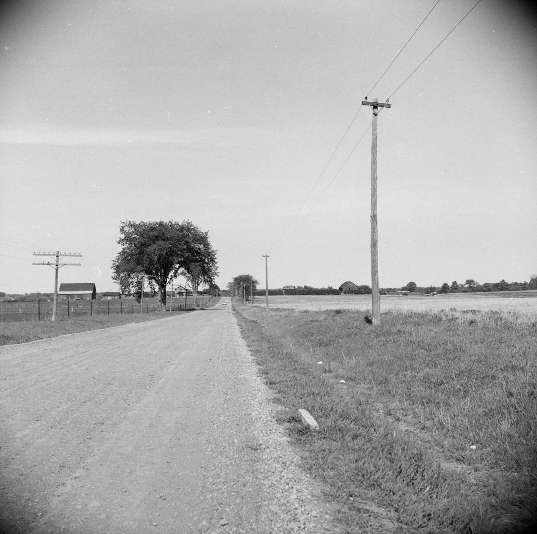 Steeles Avenue West looking east from Keele Street, Toronto, Ontario. Image shows a street view…