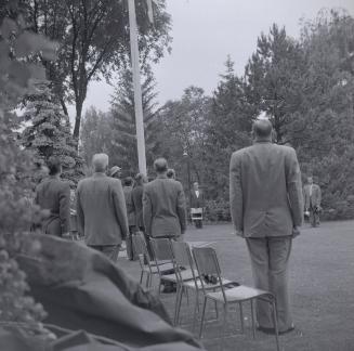 Image shows people gathered for an opening ceremony at the Edward Gardens.