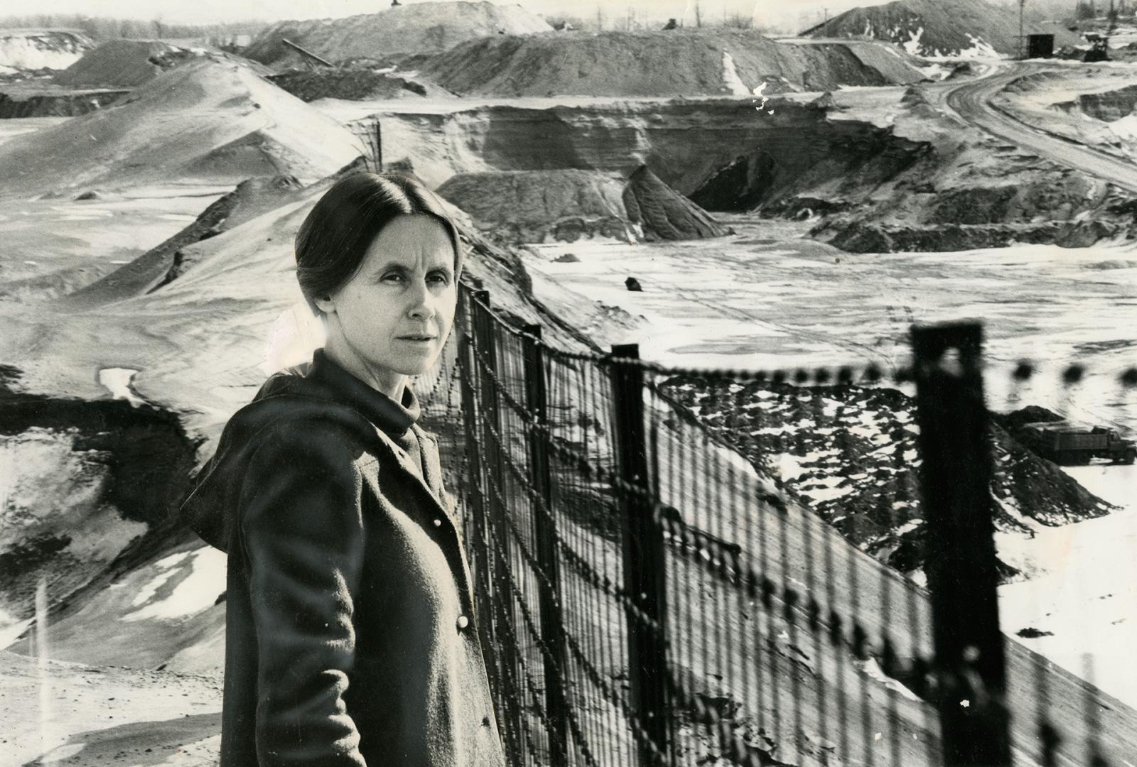 Maple resident Maria Dunker stands beside part of what could become the largest garbage dump in Canada