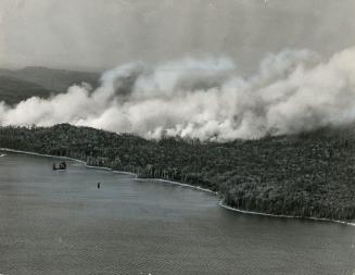 The worst forest fires in province for five years, raging in and about Algonquin park, claimed the lives of three men yesterday, who crashed while flying supplies to firefighters