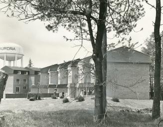 Symmetrically staggered for privacy, the first townhouses in Aurora Gardens, a $20 million project, are pictured here during official opening ceremonies last week