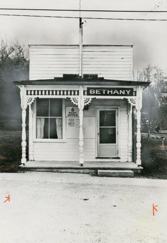 This tiny false-fronted store at Bethany in Durham County is notable not only for its size but for the delectable woodwork around its porch