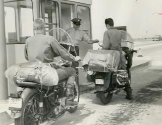 Cyclists pay up at the Burlington Skyway