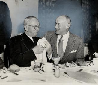 Mr. Hewitt (left) with Conn Smythe