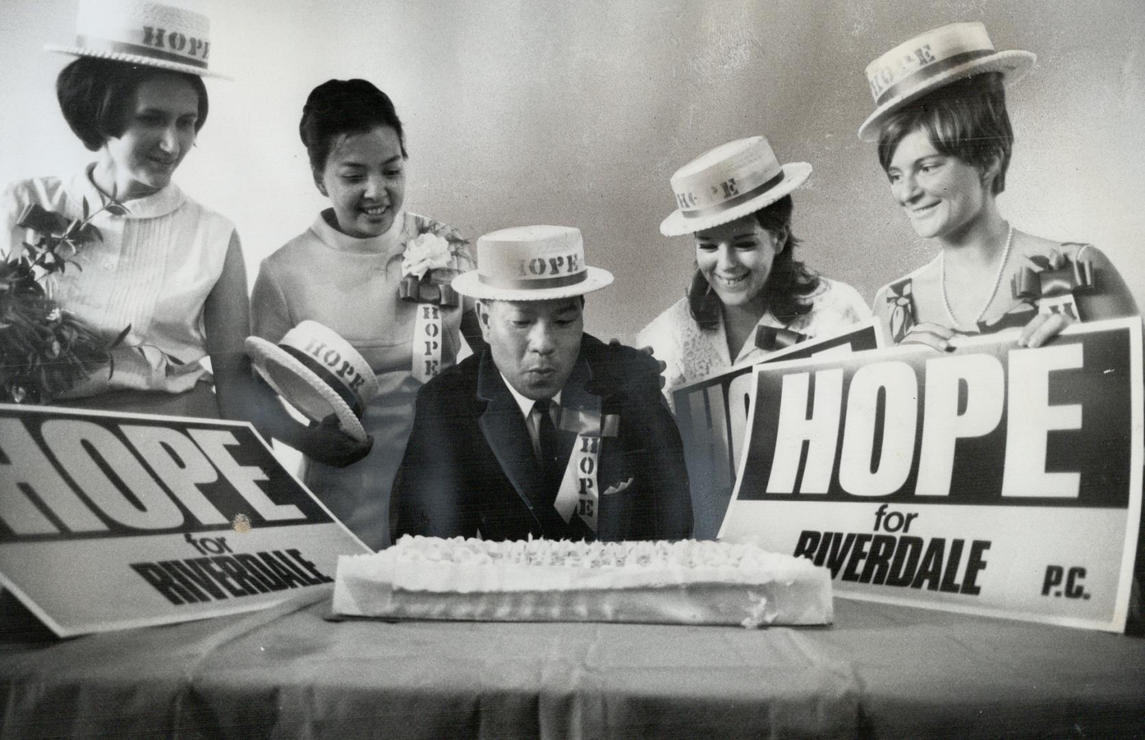 Wishing for a hope: Blowing out candles on cake at a surprise birthday party Saturday at Riverdale plaza: Conservative candidate Ying Hope: 41: makes wish for election success