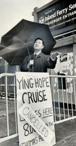 His cruise for 500 guests. cancelled because of bad weather: Alderman Ying Hope waits at the ferry dock last night for people who couldn't be notified(...)