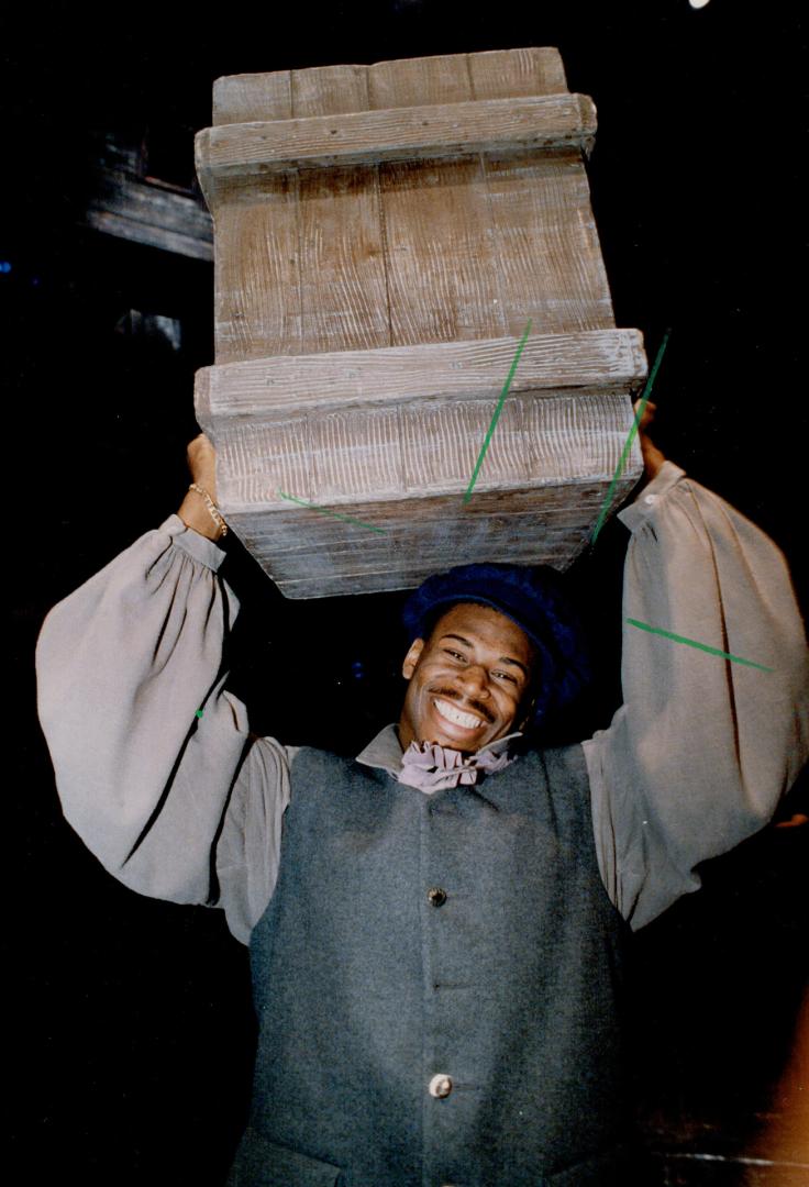 On the ball: Full back Warren Hudson Carries props in period costume for Les Miz When he's not proping up his Toronto Argonauts teammates