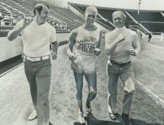 A millionaire at play. Bobby Hull (right): in Toronto to fulfil commercial commitments after signing contracts totalling $2.8 million to play for Winn(...)