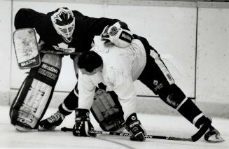 Leaf Goalie Peter ing with Brad Marsh