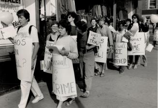 Court March: About 45 women protest outside the courtroom at the Kirby Inwood trial today