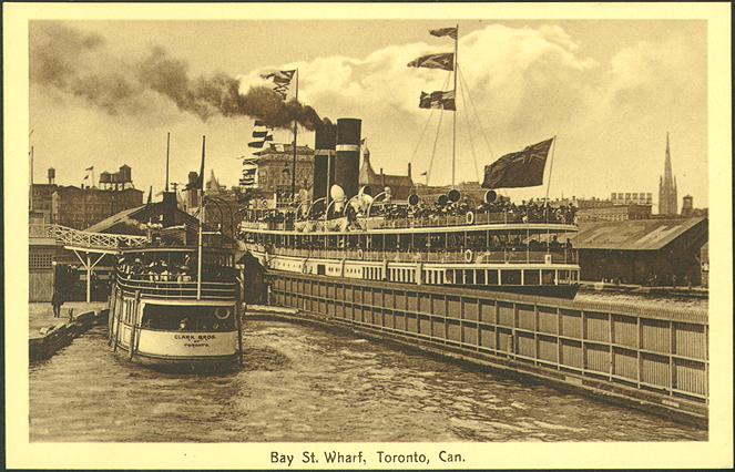 Image shows a few boats on the lake by the wharf.