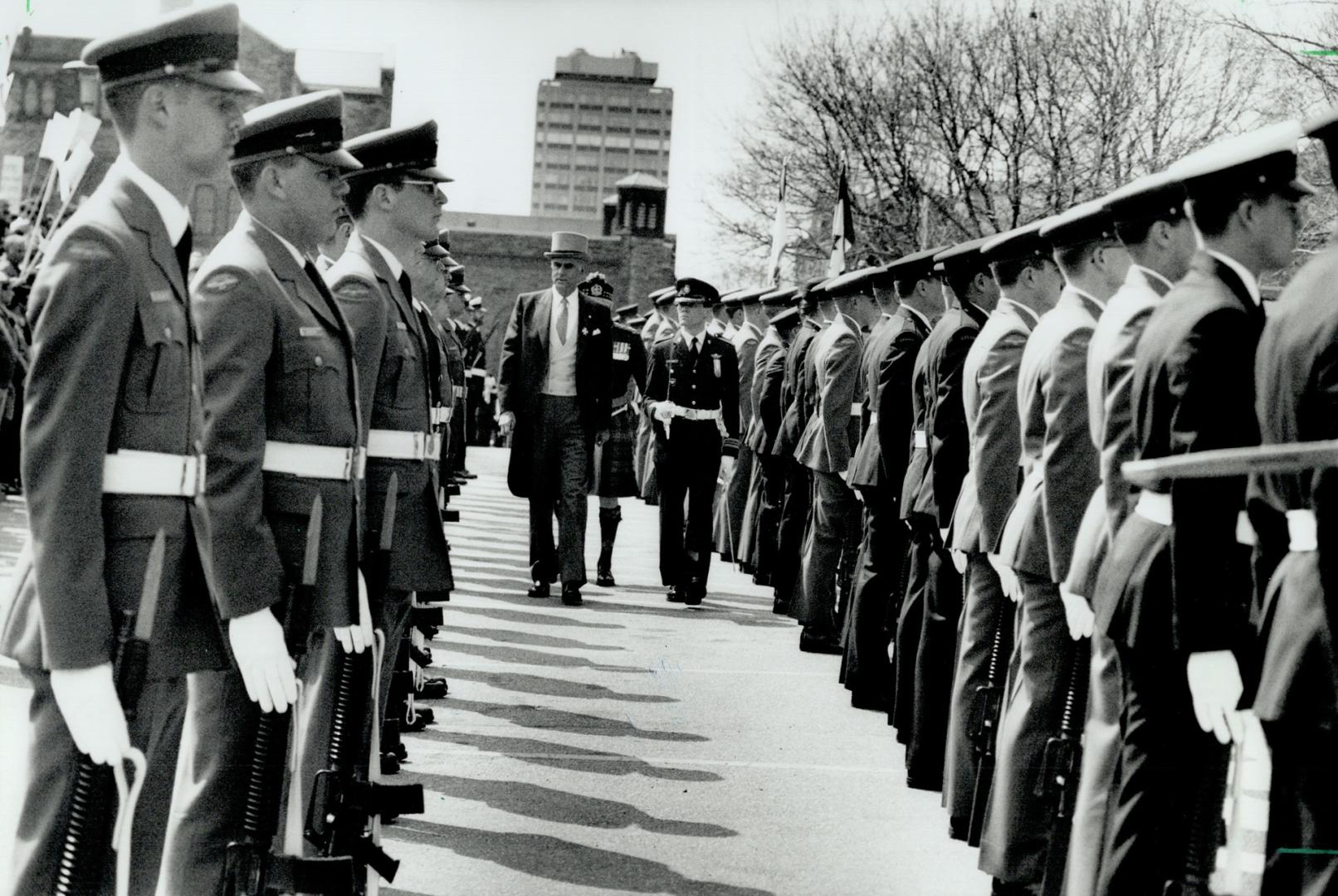 On guard: Lleutenant-Governor Hal Jackman Inspects the Guard of Honor of the Canadian Forces school of communications and electronics before reading yesterday's throne speech at Queen's Park