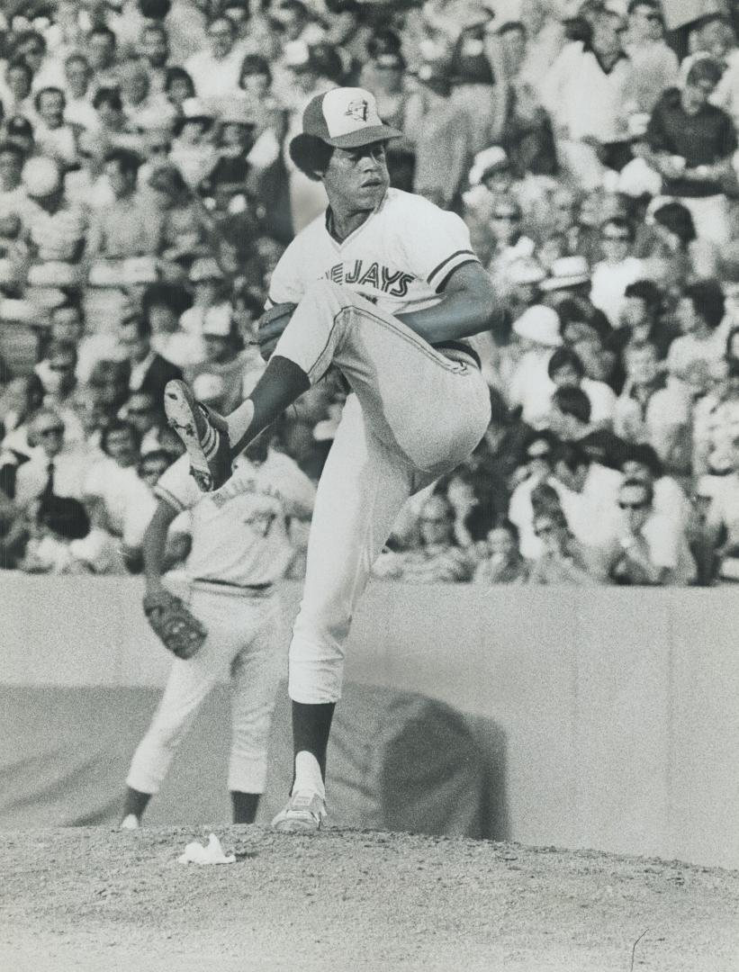 Baseball's a serious business, judging from the expression on Toronto Blue Jays pitcher Jesse Jefferson, above