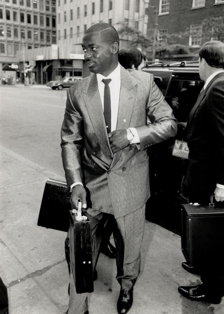 Dapper Ben: Sprint star Ben Johnson arrives this morning for his second day of testimony at the Dubin inquiry in Toronto