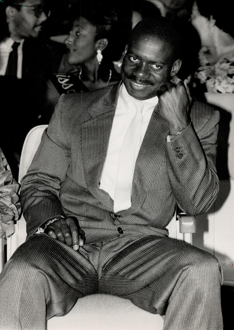 All smiles: Ben Johnson relaxes in the audience last night at the Canadian Black Achievement Awards at Ryerson Theatre, where he was honored for his contribution to sports