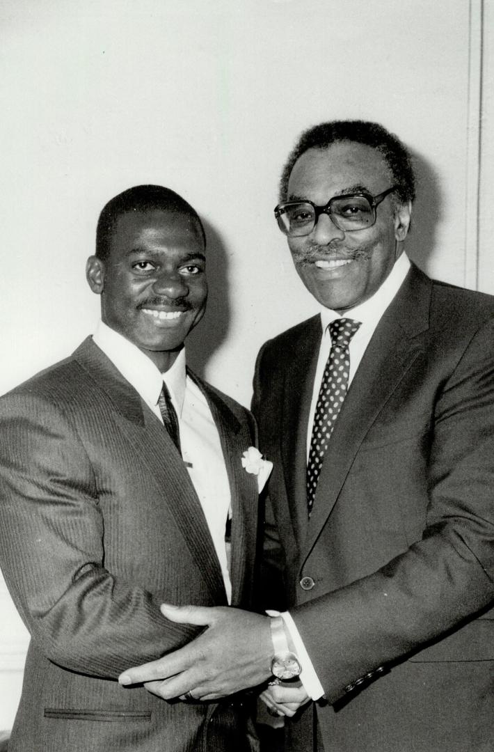 More recognition: Toronto sprinter Ben Johnson, left, is congratulated by Lieutenant-Governor Lincoln Alexander after receiving Toronto Sun award as Canada's outstanding athlete yesterday