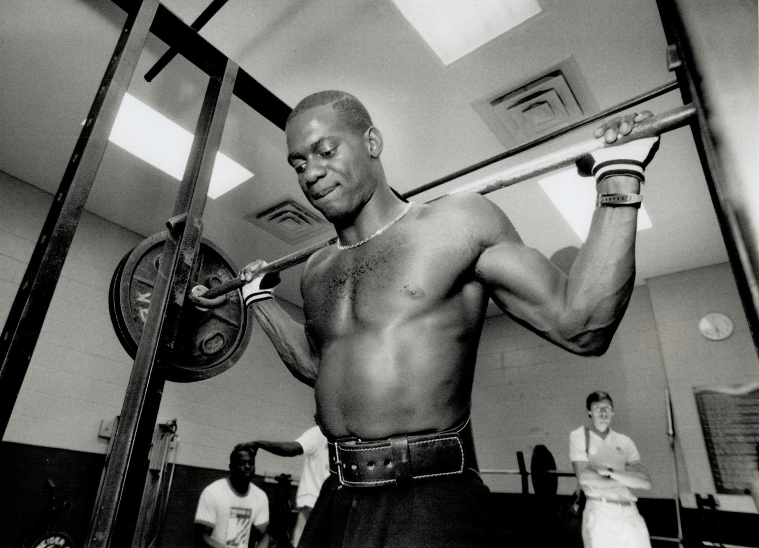 Ben Johnson lifts more than 200 pounds during weight training yesterday at York University