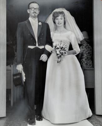 Mr. and Mrs. Ronald Earl Johnson are seen leaving Runnymede Presbyterian Church