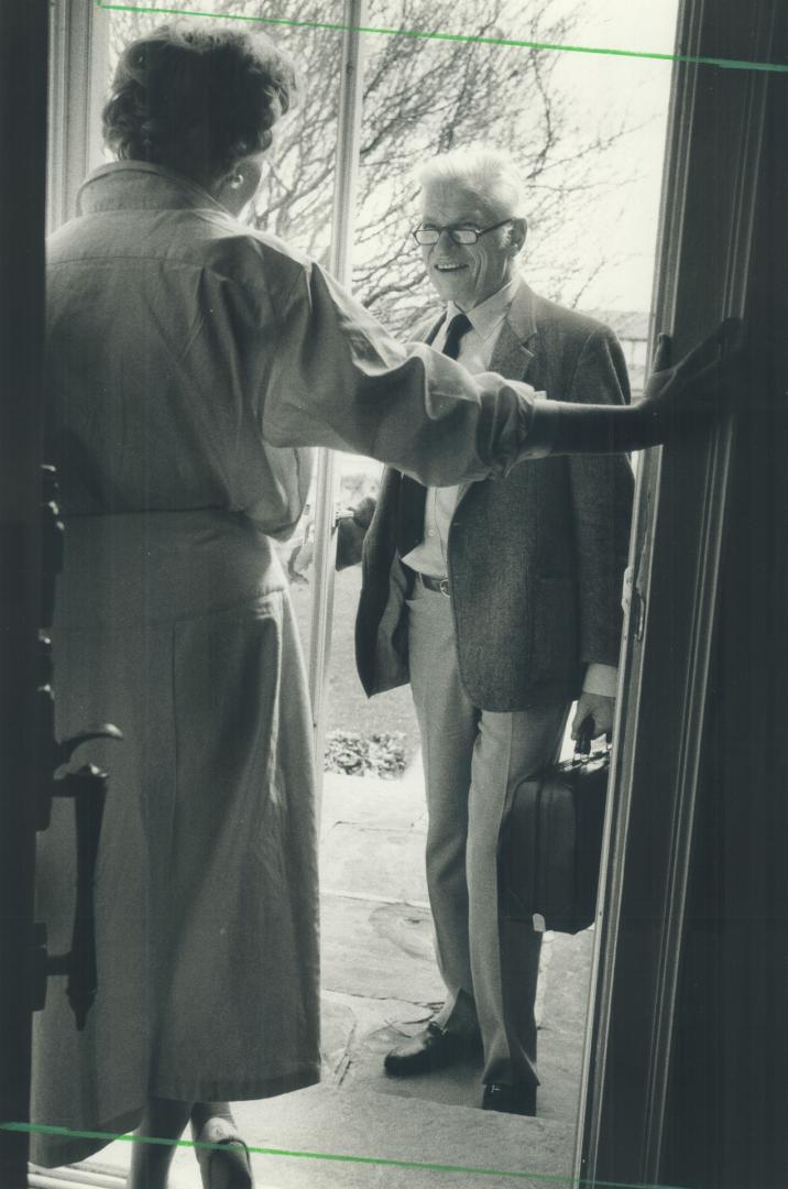 Doctor arrives: Dr. Norman Jones, 68, is welcomed as he makes a house call. Jones who admits he now prefers to see most of his patients in his office,(...)