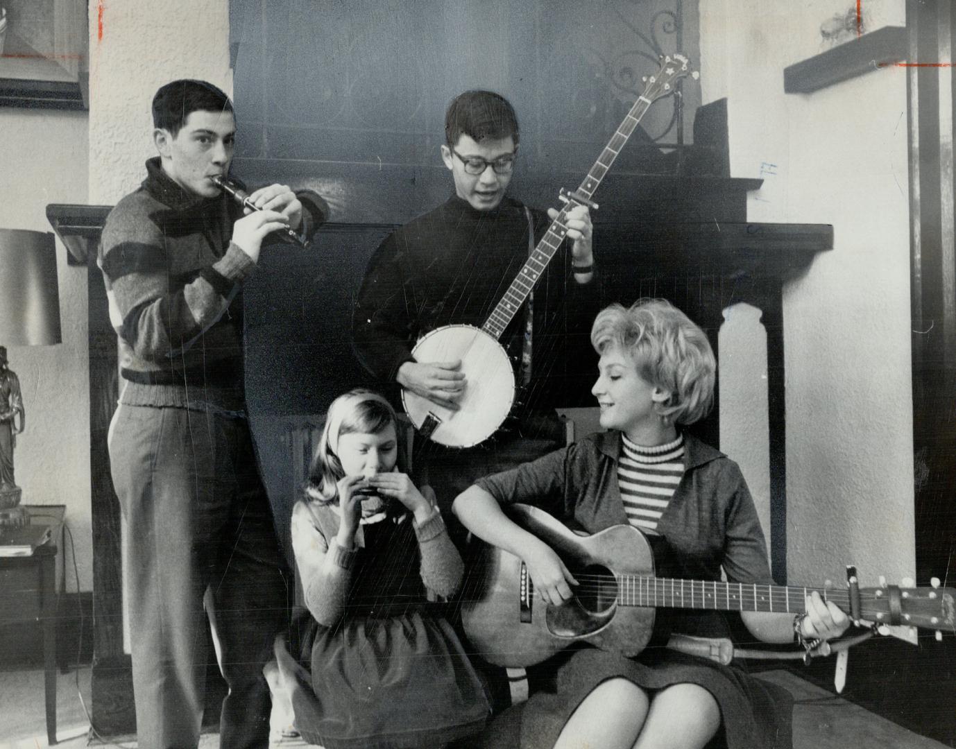 The Kastner, children holding a family Jam Session