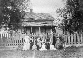 Crosson Family, 1870s, Toronto, Ontario. Image shows a group of adults and children posing for …