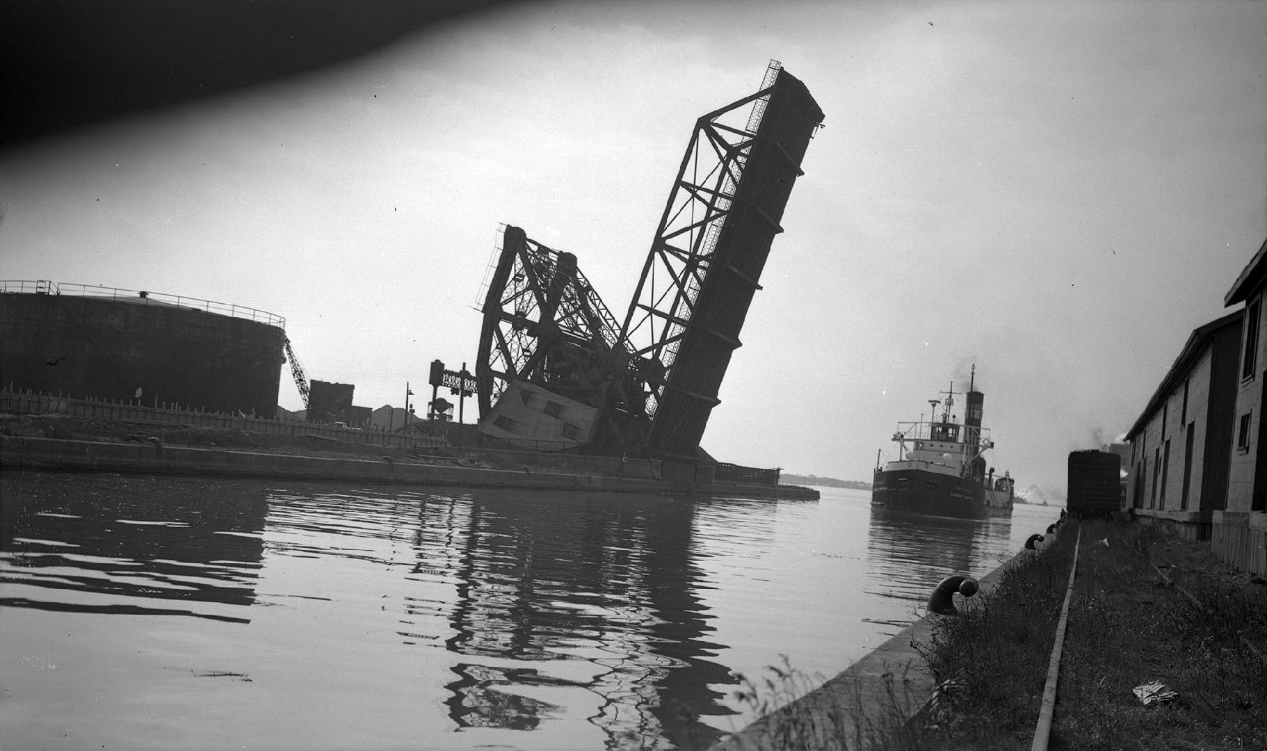 CHERRY ST., bridge over Keating Channel, showing freighter 'Britamoil'. Toronto, Ontario