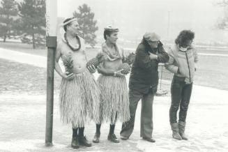 Aldermen make hula hoopla, North York aldermen Bob Yuill, left, and Ron Summers turned out in their best Hawaiian finery yesterday to promote a North (...)