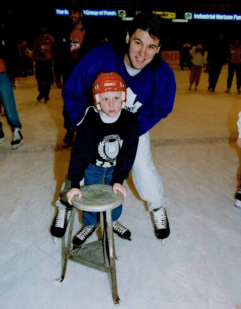 A Christmas wish come true, On cloud nine (actually Gardens Ice) yesterday at Bobby Orr's Skate with the Gardens for Easter Seals were, from left, Bre(...)