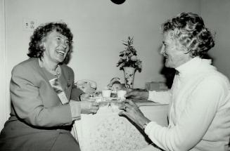 Lunch is served, Ontario Citizenship Minister Elaine Zlemba, left, delivers a Meals-on-Wheels lunch to Eva Plesha, 88