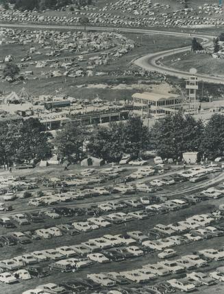 Some of the thousands of cars at Mosport today for the Players 200 race are shown in this aerial view