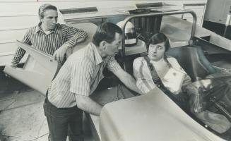 L to R Team manager Paul Cooke, Mechanic Ralph Fresken and Driver Roger McCarg