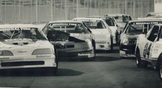 Move over! AL Chute's 1988 T-Bird got banged around quite a bit as stock car racing returned to Exhibition Stadium last night. Windsor's Don Mallat won the evening's $20,000 feature race