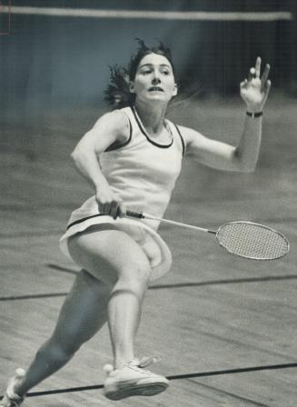 Mary Kaye of Ottawa keeps her eyes on bird during badminton victory yesterday