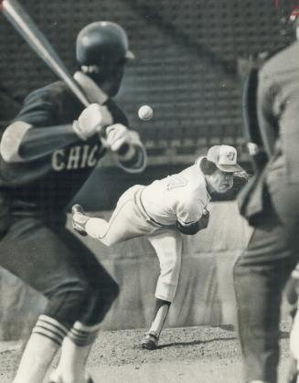 But can he hit it? White Sox third baseman Junior Moore gets good look at an offering from Jays' Jesse Jefferson