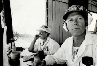 Nerve centre: Assistant Chief Marshal Roger Falconer and operator Susan Payne man the control tower