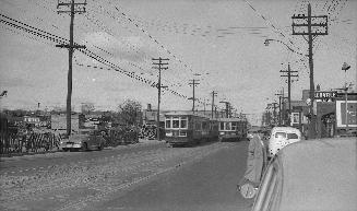 Yonge Street, looking north from south of Eglinton Avenue, Toronto, Ontario. Image shows a few …