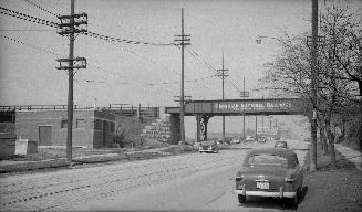 Yonge Street, looking north from south of Merton Street, Toronto, Ontario. Image shows a street…