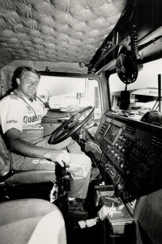 Rolling tech: Quaker State Porsche's Robert Holt in his office (above) and mobile workshop (top)