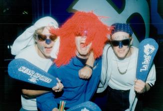 Uxbridge High School students, left to right, Paul Weekes, John Humphries and Aaron Massey go for headgear