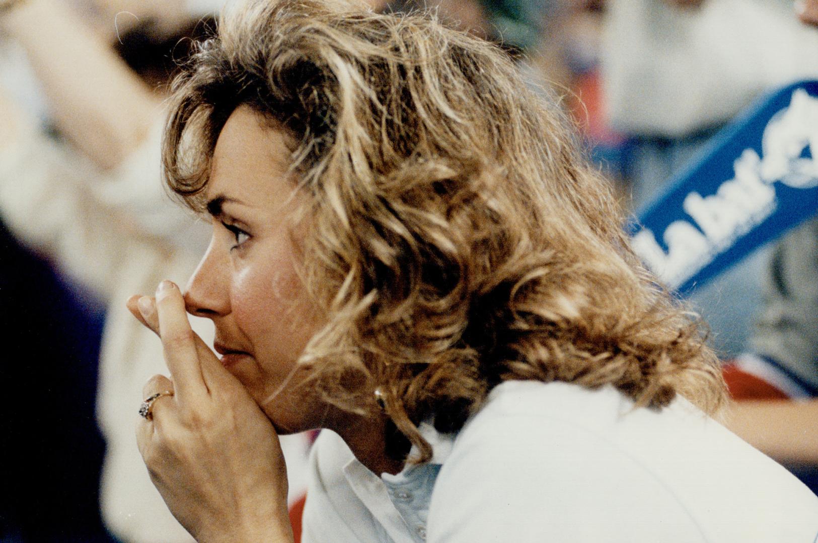 Let it be: With fingers firmly crossed, a SkyDome usher watches in the ninth inning last night after the Blue Jays' Tom Henke relieved starter David Cone to preserve a win over the Oakland A's