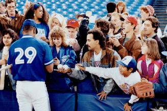 Can't keep a good man down: Injured in Friday night's game, Joe Carter was back signing autographs and playing last night