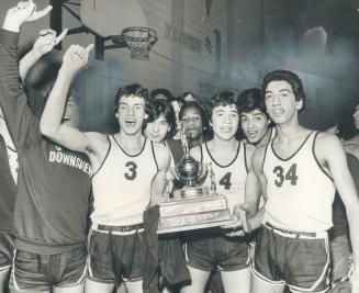 Cage champs celebrate. North York high school junior basketball champion Downsview Mustangs proudly display trophy, earned with a 68-49 victory over S(...)