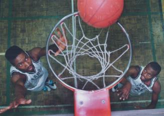 On the edge. Scarborough's Pearson Bengals Dave Small, left, and Kenrick Hopkinson, practise for a tough basketball game this Saturday against a Michi(...)