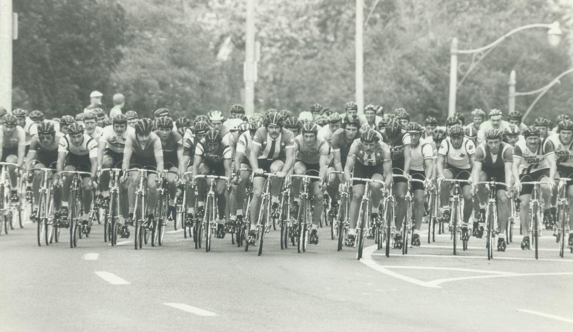 It was the change of the bike brigade at Queen's Park yesterday as 130 cyclists went after the first prize in the Carling O'Keefe International Grand Prix of Cycling