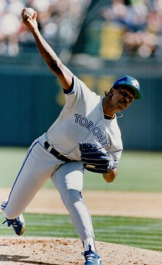 Juan Guzman (left) Pours in another strike