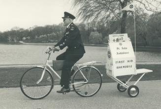 Firs-aid-mobile: St. John Ambulance Divisional Office Ken McOrmond pedals along the route of the Variety Club Bike-A-Thon near High Park ready to help(...)